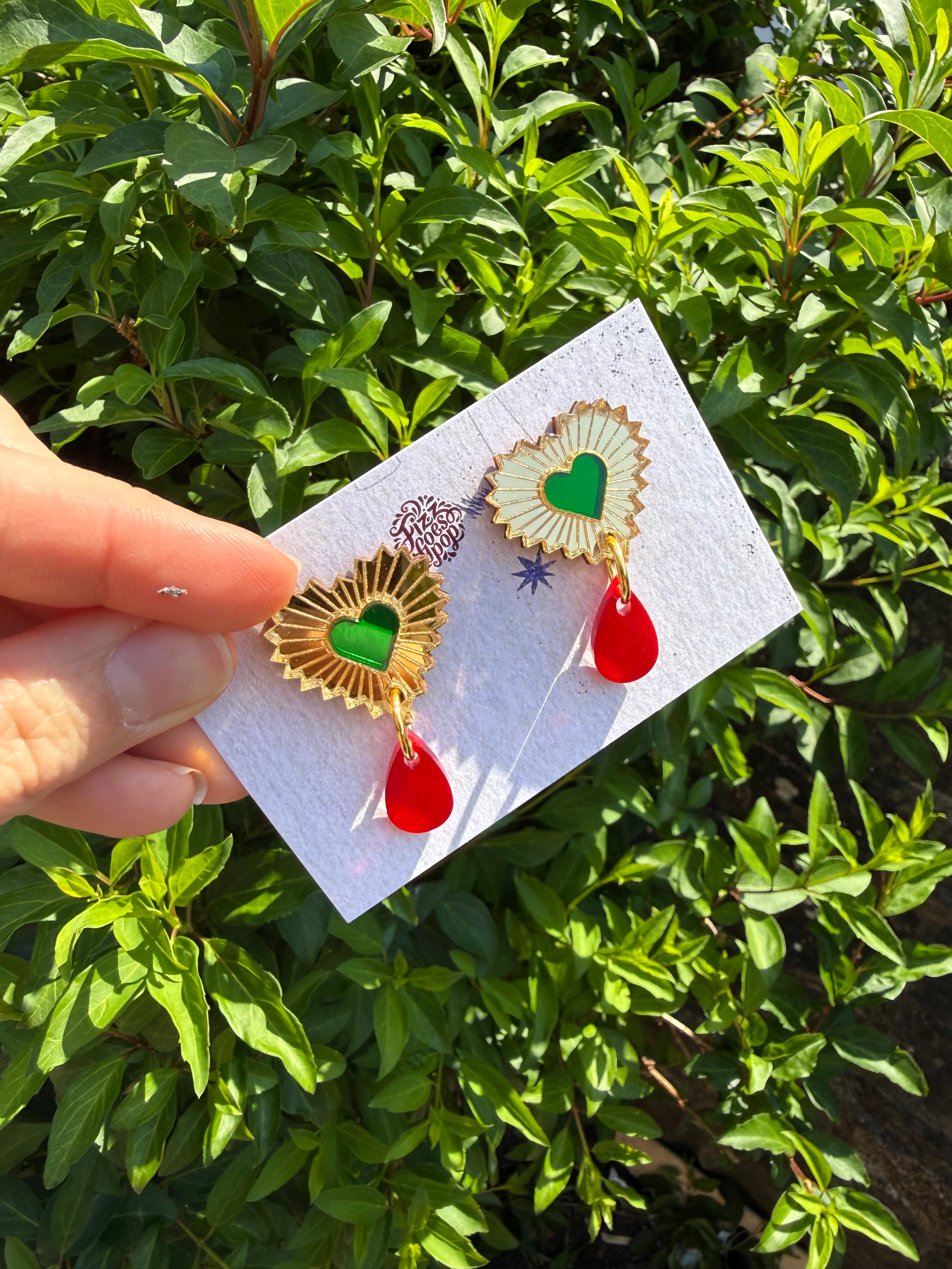 Heart with green middle earrings.
