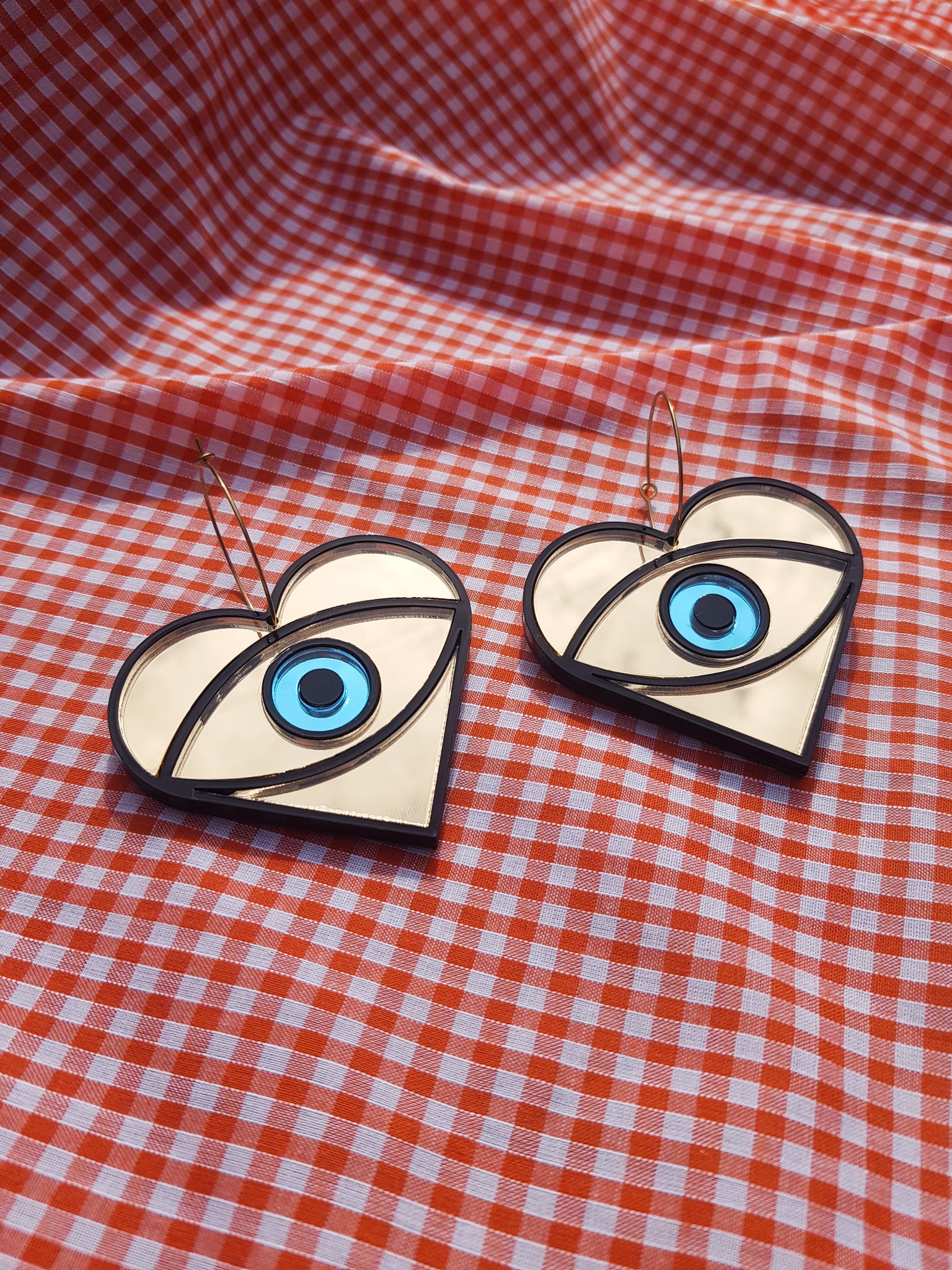 Large statement eye earrings