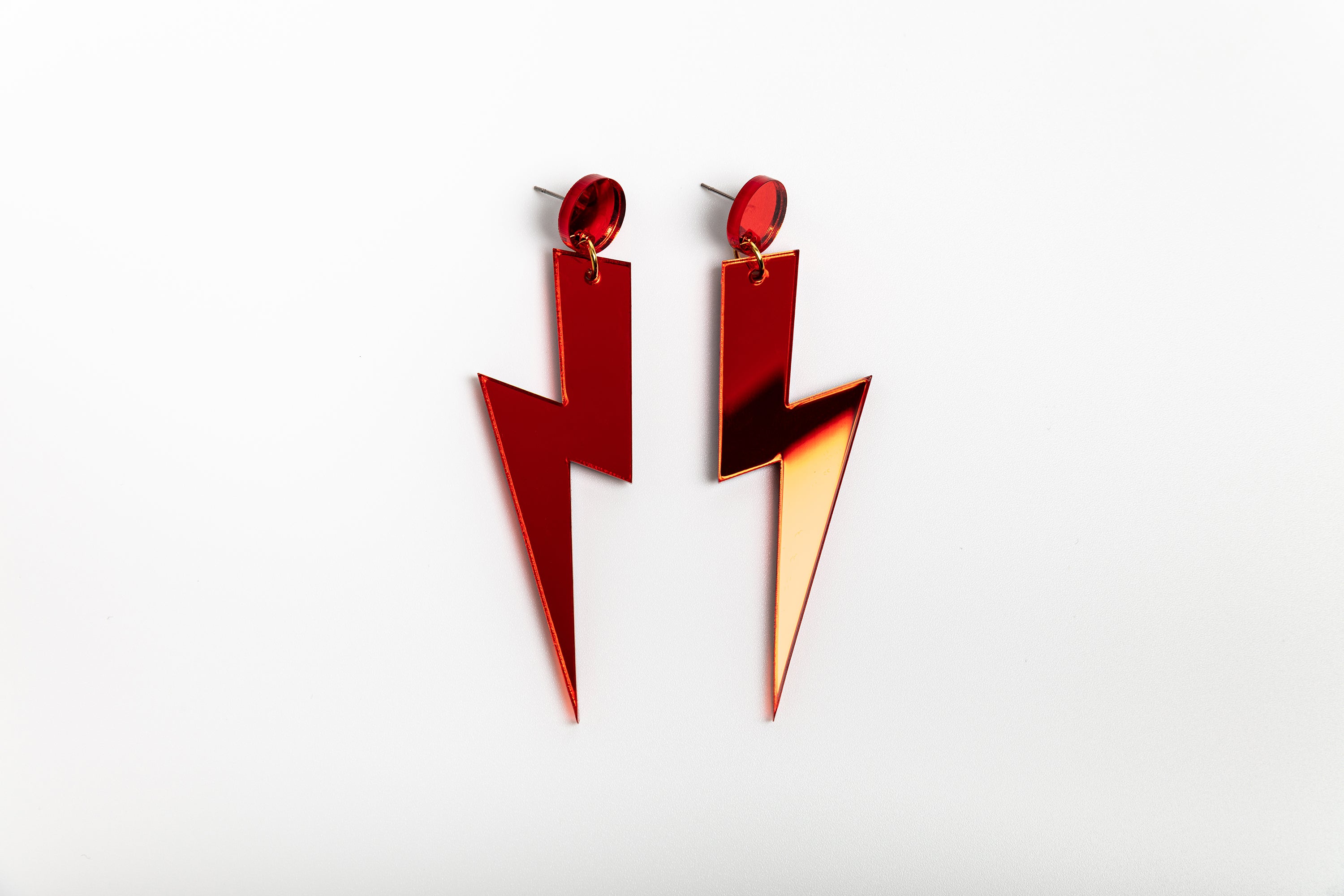 Red statement lightning bolt earrings