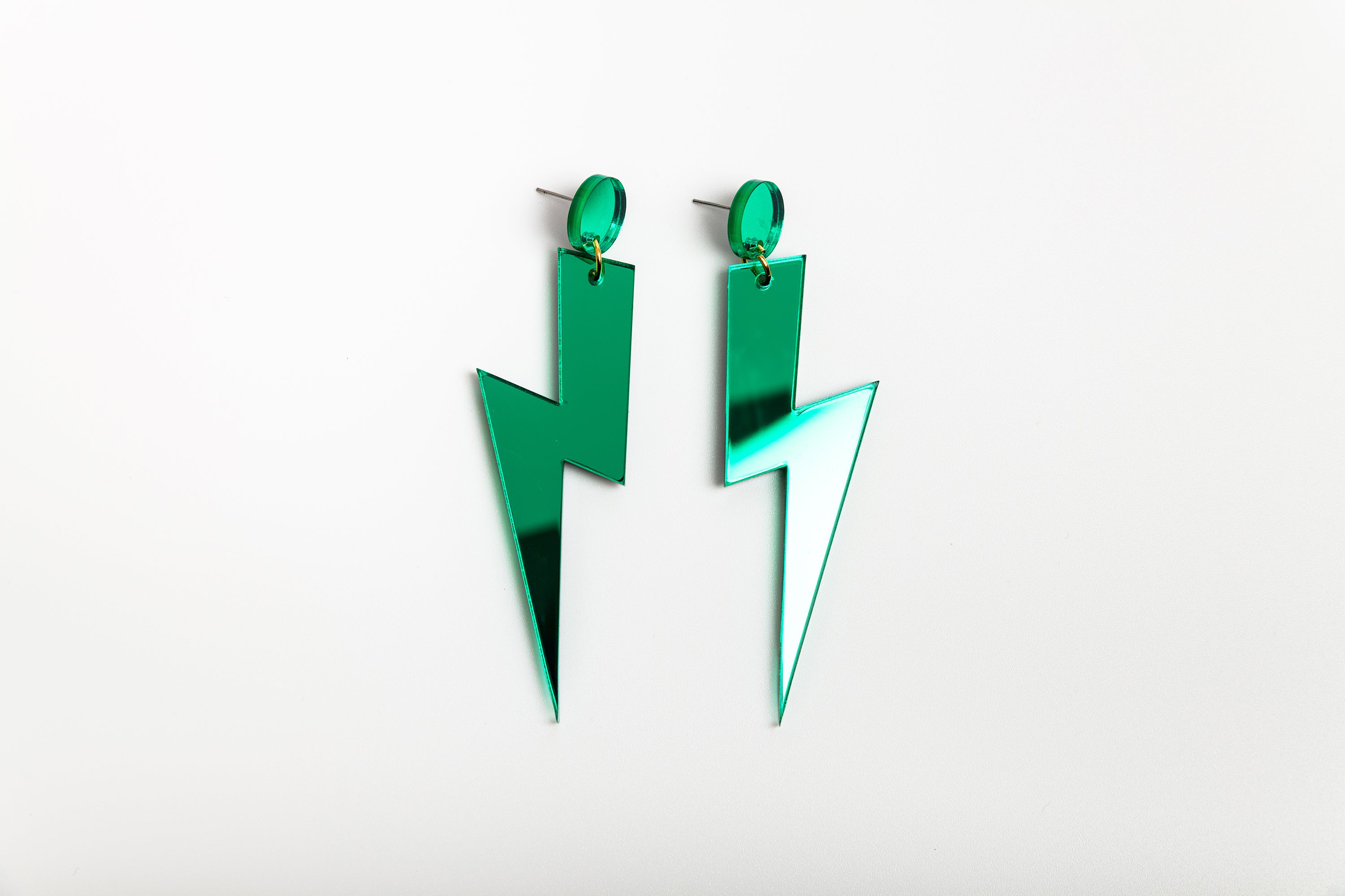 Light green statement lightning bolt earrings