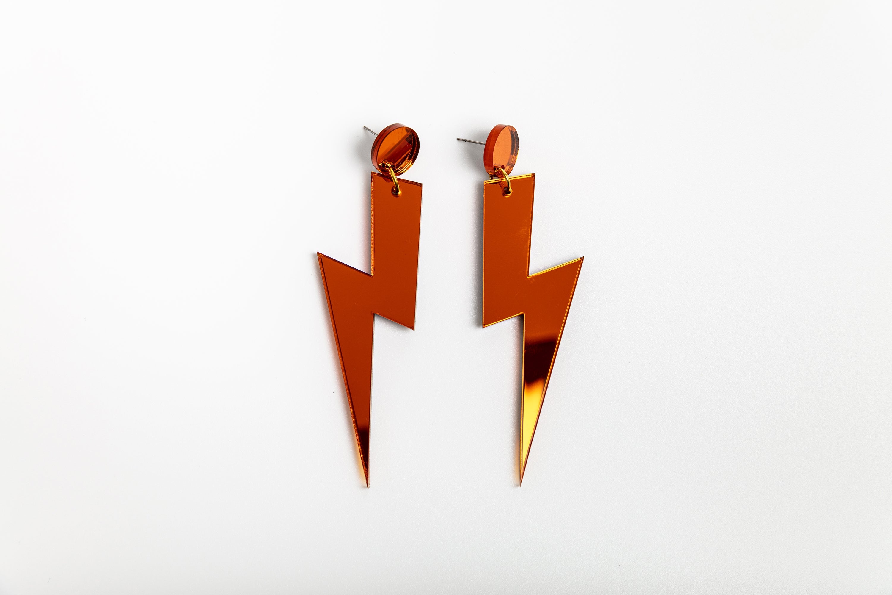 Orange statement lightning bolt earrings