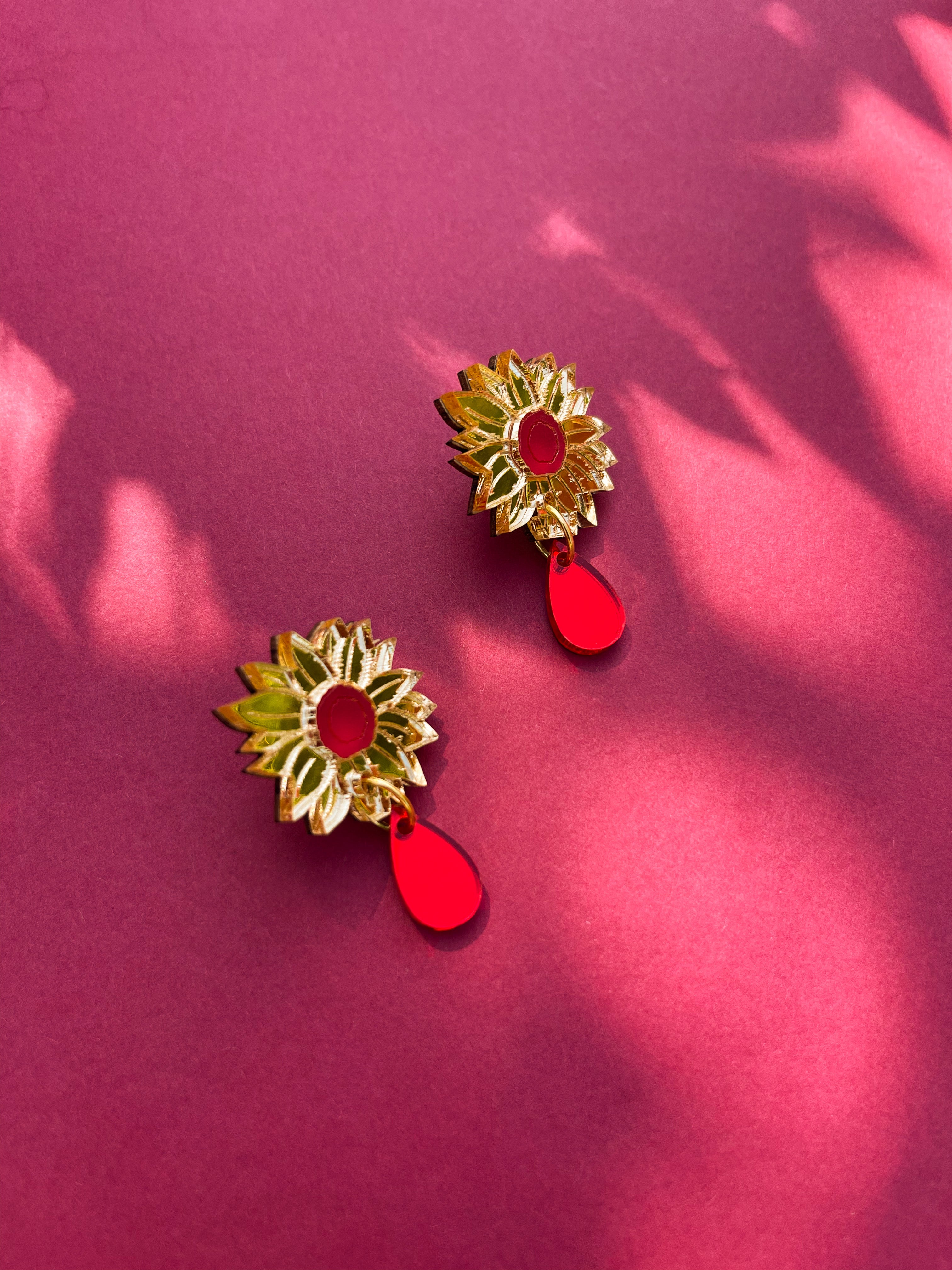 Sunflower stud with red drop
